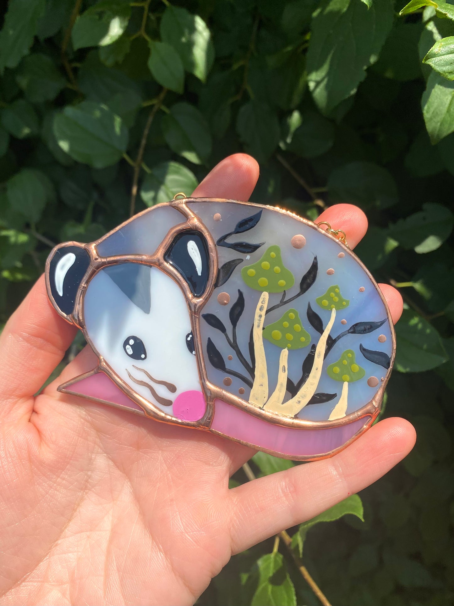 Sleepy Green Mushroom Opossum Stained Glass Ornament