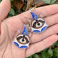 Blue and Gold Wizard Raccoon Acrylic Earrings