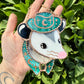 Mini Teal Cowboy Opossum Stained Glass Ornament