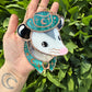 Mini Teal Cowboy Opossum Stained Glass Ornament