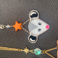 Orange Star Opossum Stained Glass Charm
