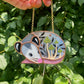Sleepy Green Mushroom Opossum Stained Glass Ornament