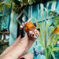 Backpack Racoon Figurine